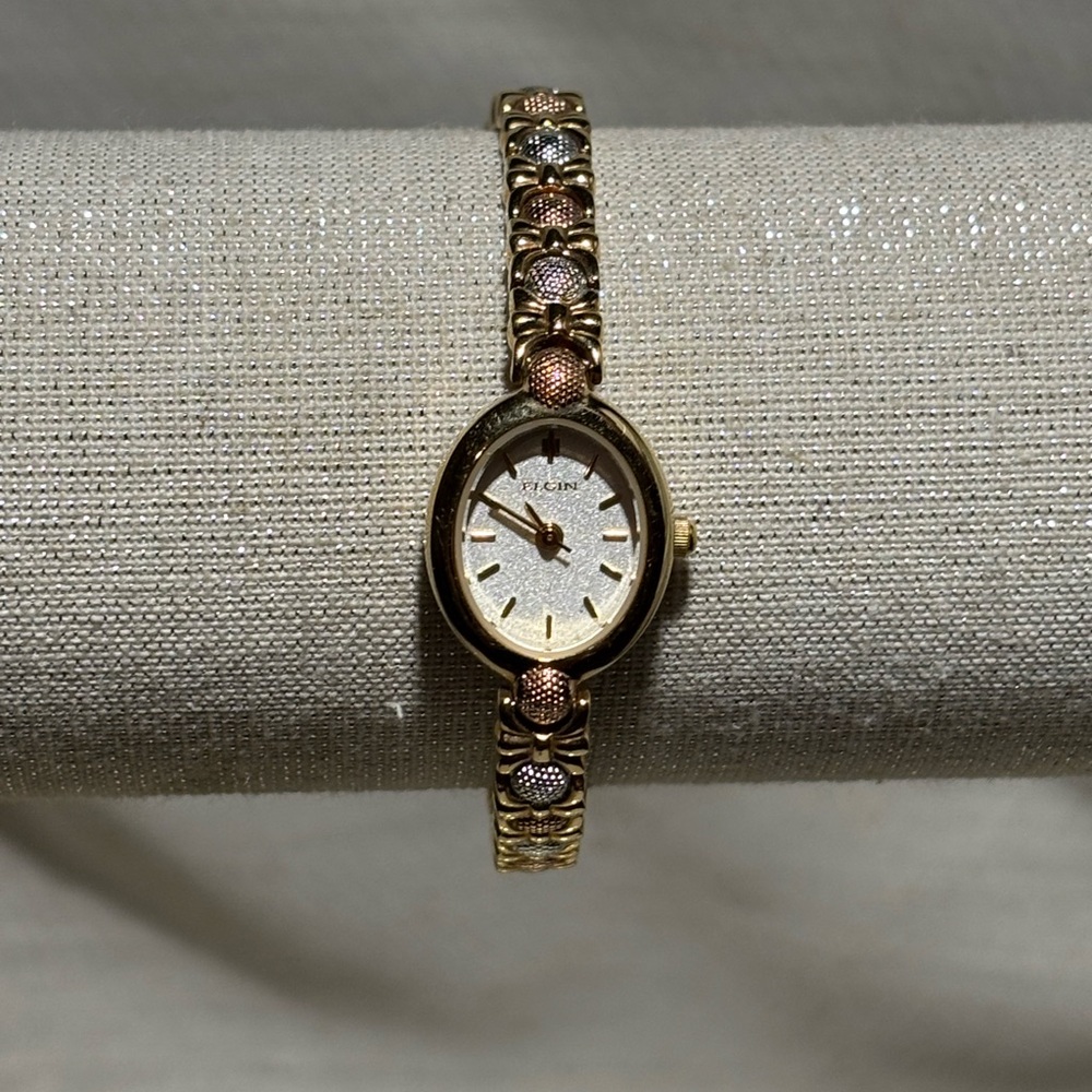 Gold and Silver Vintage-Style Watch with Roman Numerals